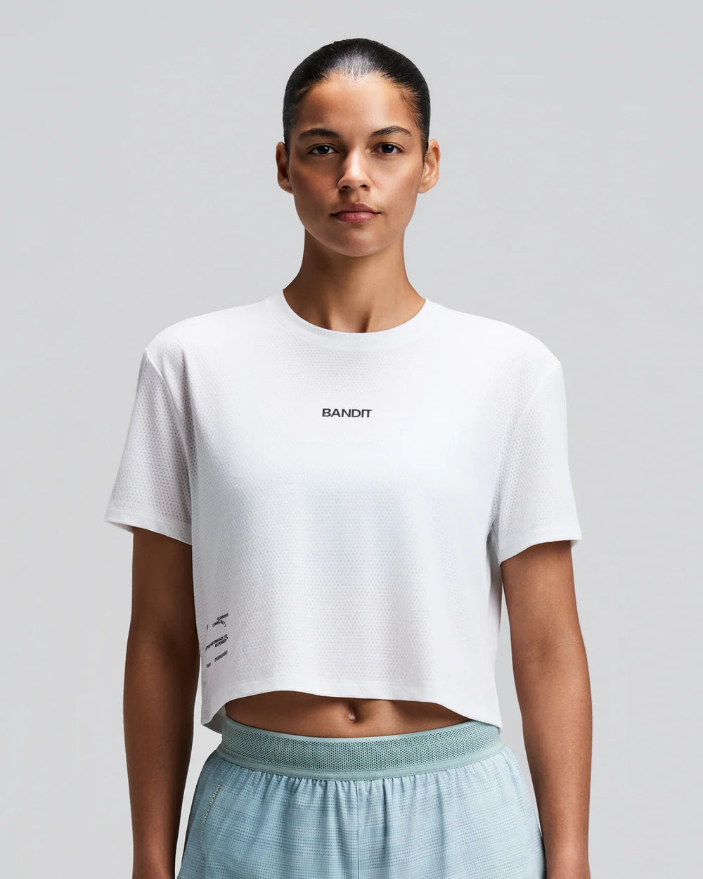 Bandit Running Women's Micromesh Cropped Tee in WHITE