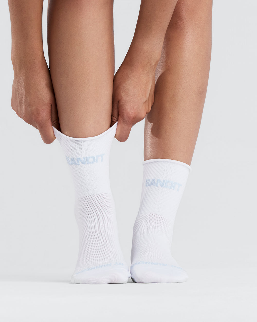 Bandit Running Unisex Rib Knit Sock in WHT