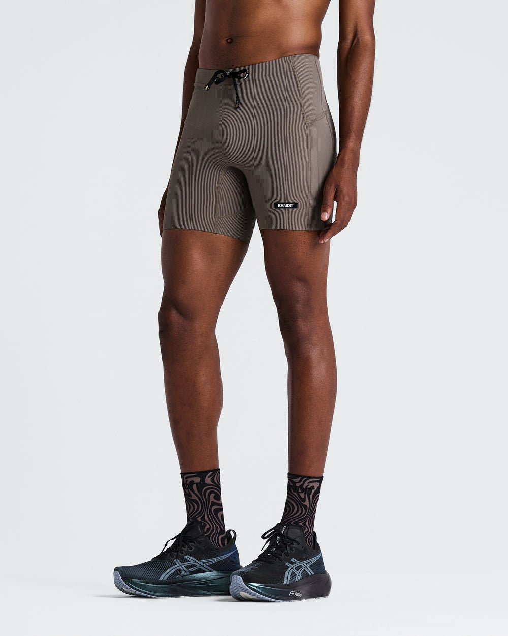 Bandit Running Men's Striped 1/4 Tight in TAU/COC