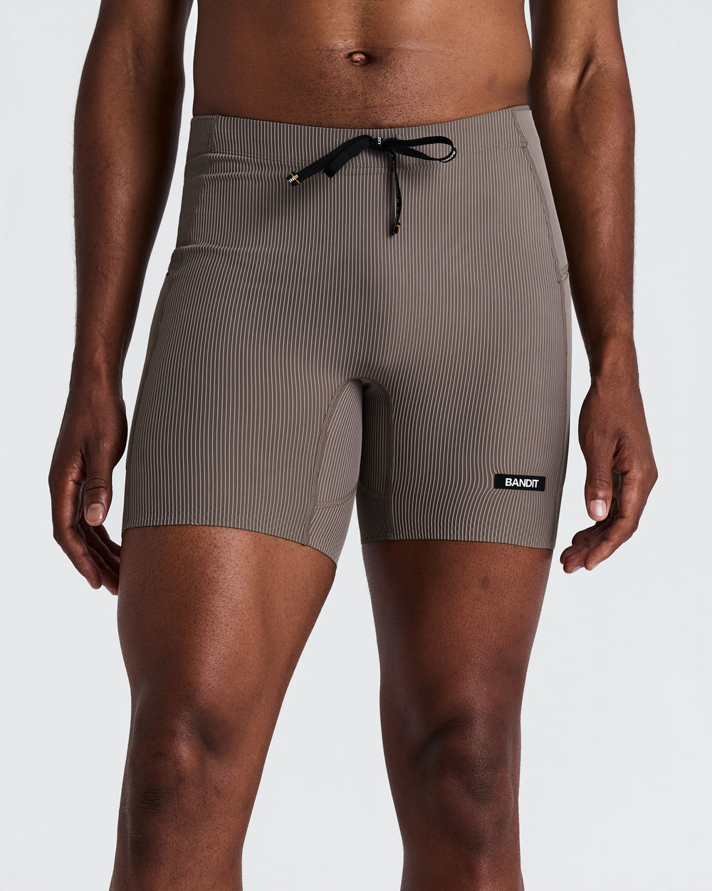 Bandit Running Men's Striped 1/4 Tight in TAU/COC